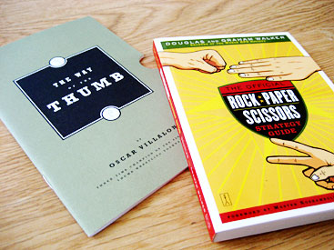 Photo of books: age showing thumb wrestling positions